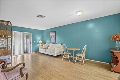 Welcome to this charming 1-bedroom, 1.5-bath villa offering - photo 2