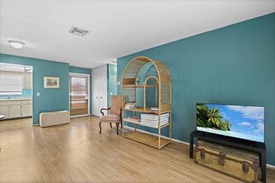 Welcome to this charming 1-bedroom, 1.5-bath villa offering - photo 4