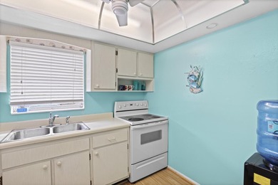 Welcome to this charming 1-bedroom, 1.5-bath villa offering - photo 8