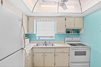 Welcome to this charming 1-bedroom, 1.5-bath villa offering - photo 9