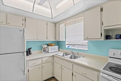Welcome to this charming 1-bedroom, 1.5-bath villa offering - photo 10