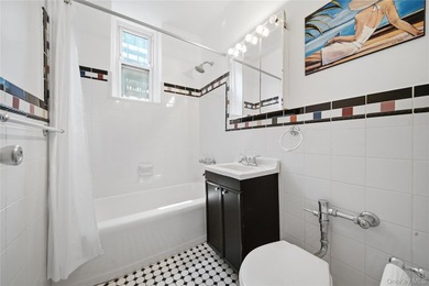 Welcome to this move-in-ready garden-level studio co-op at - photo 12