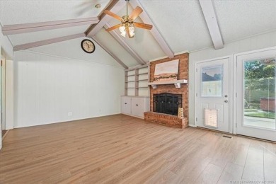 One-level full-brick home in Jenks Schools, featuring 4 bedrooms