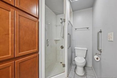 One-level full-brick home in Jenks Schools, featuring 4 bedrooms