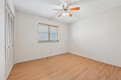 One-level full-brick home in Jenks Schools, featuring 4 bedrooms