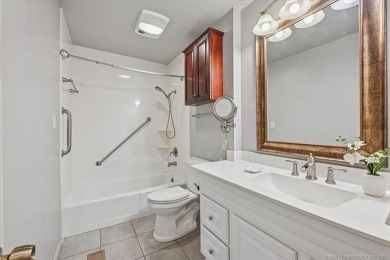 One-level full-brick home in Jenks Schools, featuring 4 bedrooms