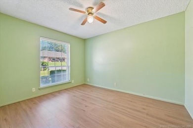 One-level full-brick home in Jenks Schools, featuring 4 bedrooms