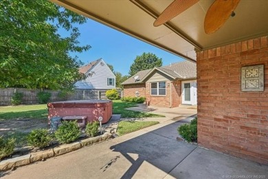 One-level full-brick home in Jenks Schools, featuring 4 bedrooms