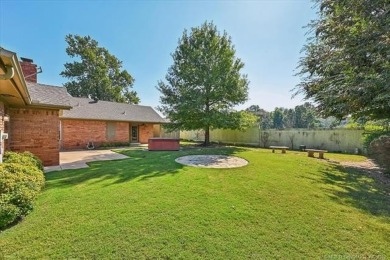 One-level full-brick home in Jenks Schools, featuring 4 bedrooms