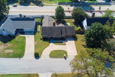One-level full-brick home in Jenks Schools, featuring 4 bedrooms