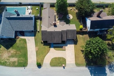 One-level full-brick home in Jenks Schools, featuring 4 bedrooms