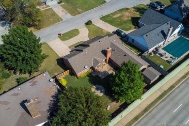 One-level full-brick home in Jenks Schools, featuring 4 bedrooms