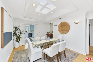 Welcome home to this rarely available top-floor condo offering