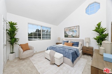 Welcome home to this rarely available top-floor condo offering