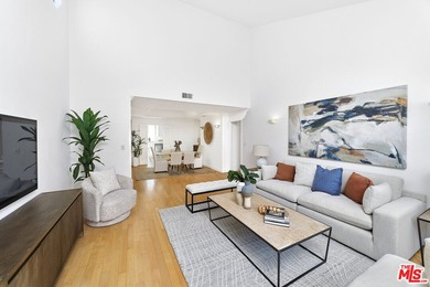 Welcome home to this rarely available top-floor condo offering