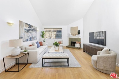 Welcome home to this rarely available top-floor condo offering