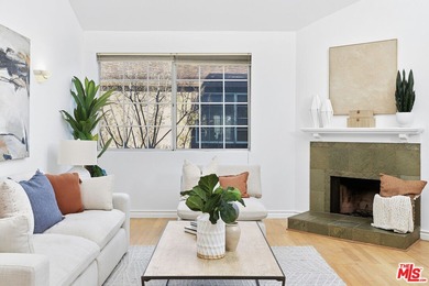 Welcome home to this rarely available top-floor condo offering