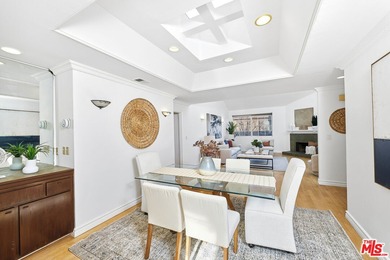 Welcome home to this rarely available top-floor condo offering