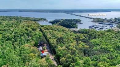 Set on a beautifully maintained 1.2 acre +/- lot, 195 Coast - photo 2