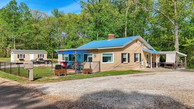 Set on a beautifully maintained 1.2 acre +/- lot, 195 Coast - photo 3