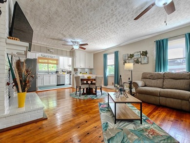 Set on a beautifully maintained 1.2 acre +/- lot, 195 Coast - photo 10