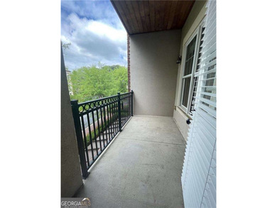 Take a look at this charming 1-bedroom, 1.5-bath condo in the