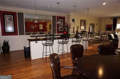 Take a look at this charming 1-bedroom, 1.5-bath condo in the