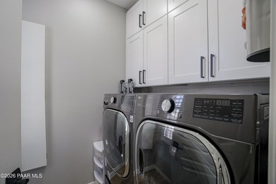 Experience elevated, low-maintenance living in the prestigious - photo 19