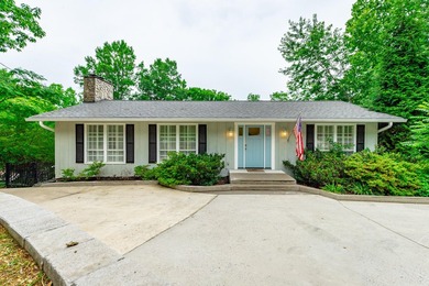 Welcome to 1043 Clift Cave Drive, where breathtaking waterfront - photo 1