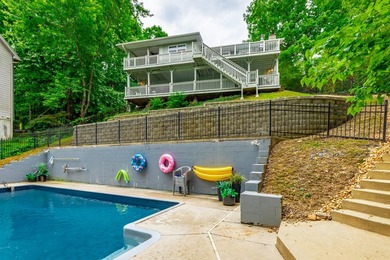 Welcome to 1043 Clift Cave Drive, where breathtaking waterfront - photo 3