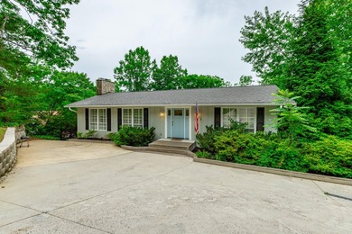 Welcome to 1043 Clift Cave Drive, where breathtaking waterfront - photo 4