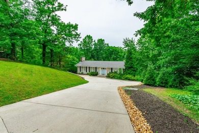 Welcome to 1043 Clift Cave Drive, where breathtaking waterfront - photo 7
