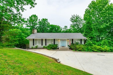 Welcome to 1043 Clift Cave Drive, where breathtaking waterfront - photo 8