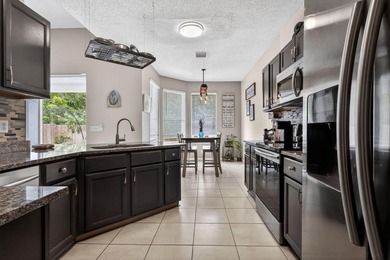 NEW roof on this gorgeous updated 3BR/2BA/ 2 car garage, gated - photo 8