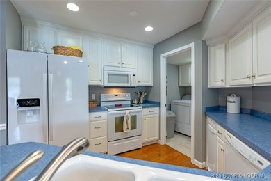 Check this beauty out! This well-cared-for, urn-key unit - photo 11