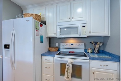 Check this beauty out! This well-cared-for, urn-key unit - photo 15