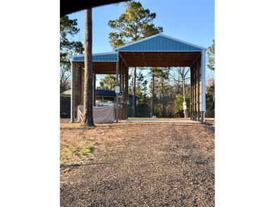 This versatile .47acre corner lot offers a readytouse RV cover - photo 19