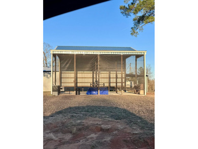 This versatile .47acre corner lot offers a readytouse RV cover - photo 21