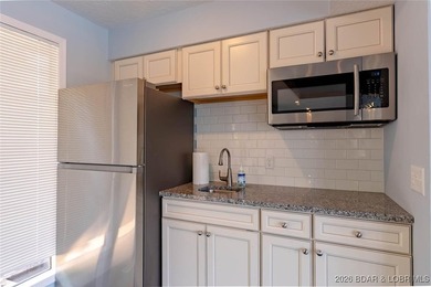 Check this beauty out! This well-cared-for, urn-key unit - photo 45