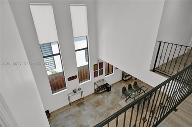 Fully remodeled villa-style residence in the highly desirable - photo 3