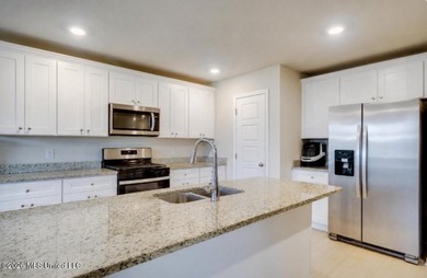 Welcome home to this beautifully designed 4 bedroom, 2 bath home - photo 6