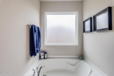 Welcome home to this beautifully designed 4 bedroom, 2 bath home - photo 10