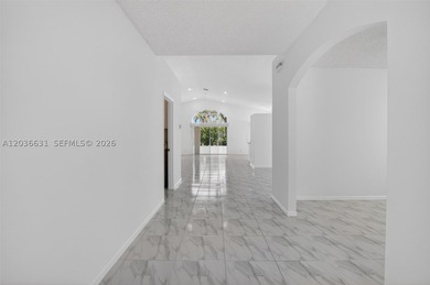 Welcome to this well-maintained Palm Beach residence in Estates - photo 3