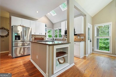 Welcome home to this spacious four-bedroom - photo 19