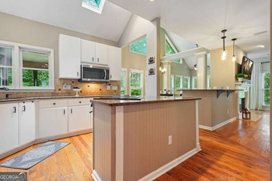 Welcome home to this spacious four-bedroom - photo 20