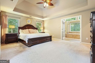 Welcome home to this spacious four-bedroom - photo 36