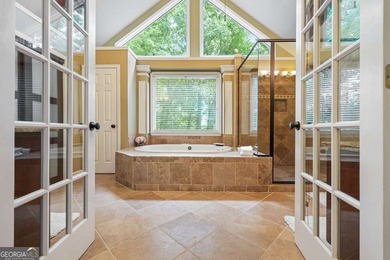 Welcome home to this spacious four-bedroom - photo 39