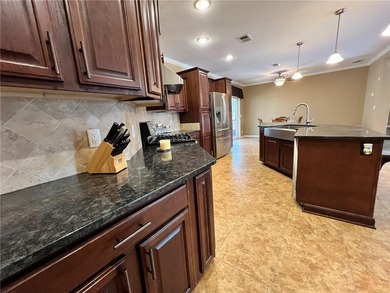 Well-maintained home on approximately 6 acres with a stocked