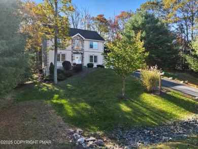 WELCOME TO 104 WOLF HOLLOW RD, A GOLF LOVERS DREAM!! This