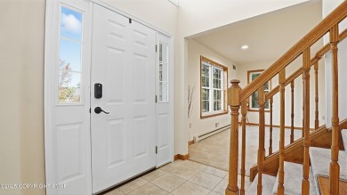 WELCOME TO 104 WOLF HOLLOW RD, A GOLF LOVERS DREAM!! This